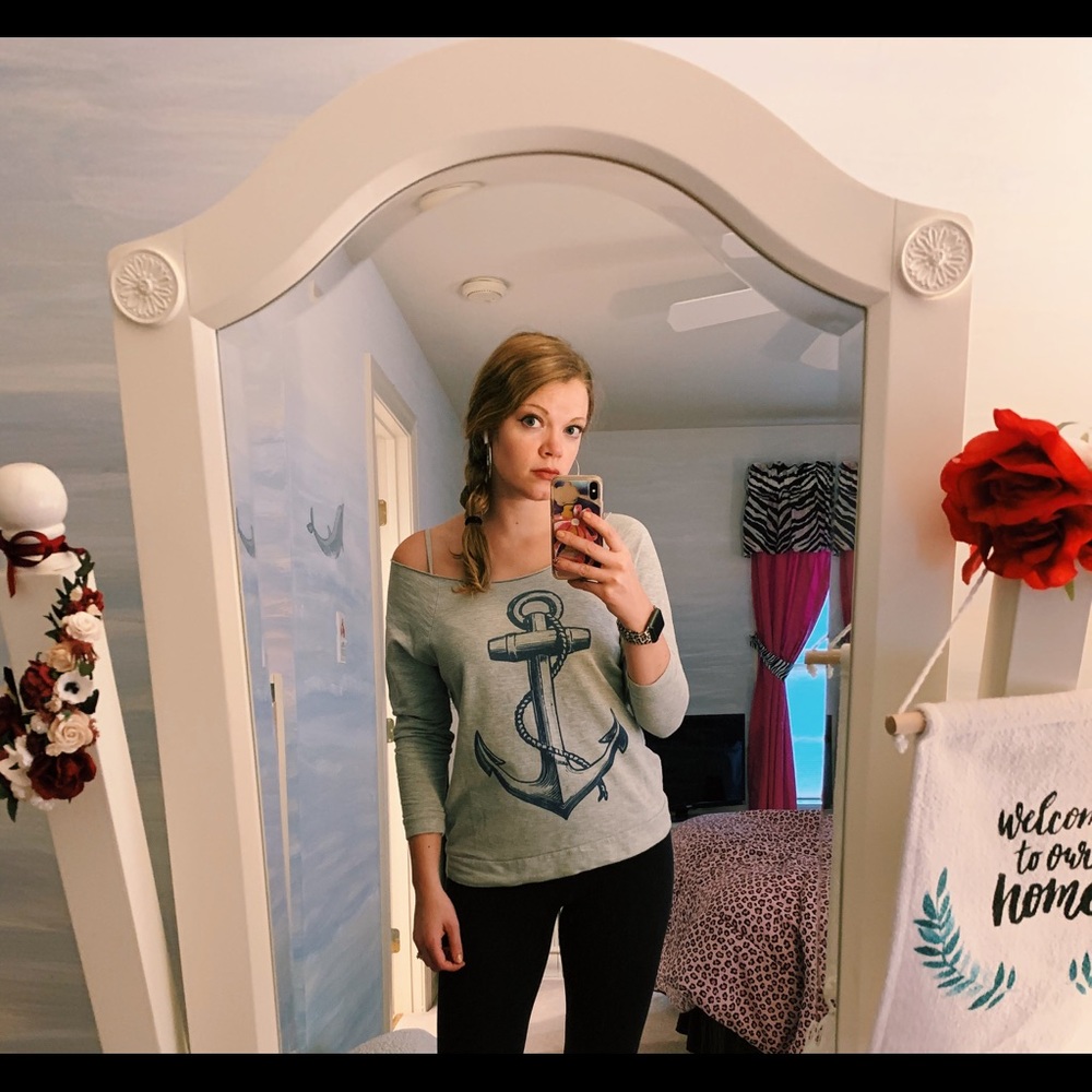 Woman’s grey anchor off the shoulder sweatshirt